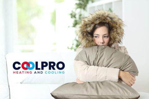 A woman holding a pillow with the words colpro heating and cooling.
