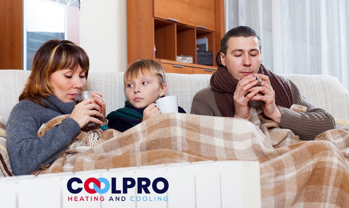 A family sitting on a couch with the words colpro heating and cooling.