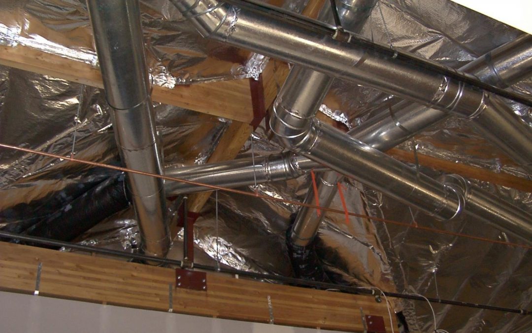 installing duct work in the attic