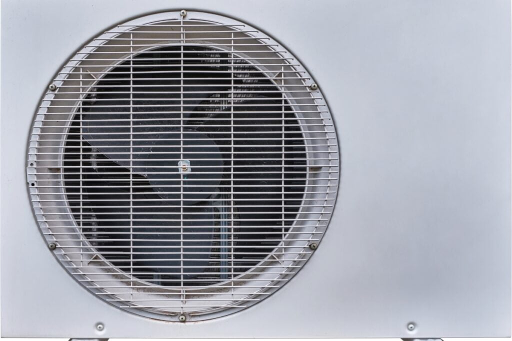 A non-functioning condenser fan on a white background.