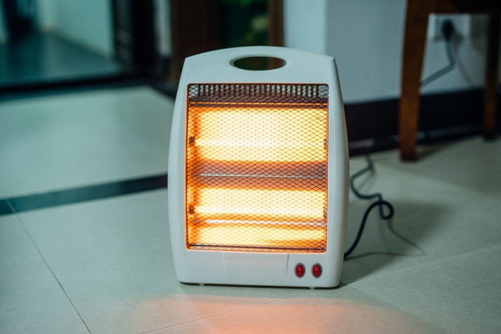 A heater efficiently positioned on a floor to maintain warmth in a room during winter.